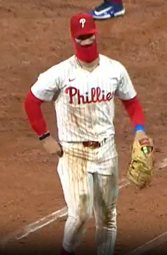 Bryce Harper in a uniform covered with dirt and grass stains