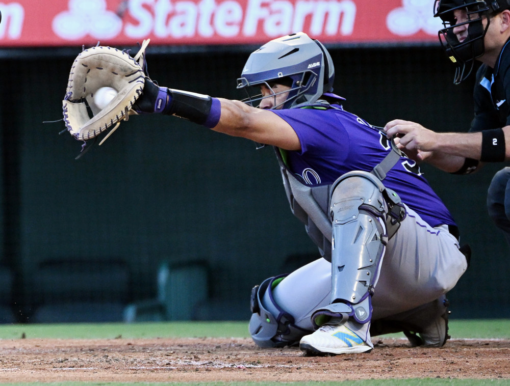 Elias Diaz frames a pitch from a catching stance