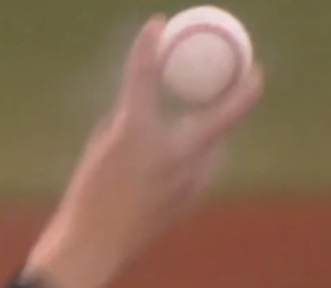 Sasaki's splitter grip has the baseball such that the seams have a horseshoe appearance