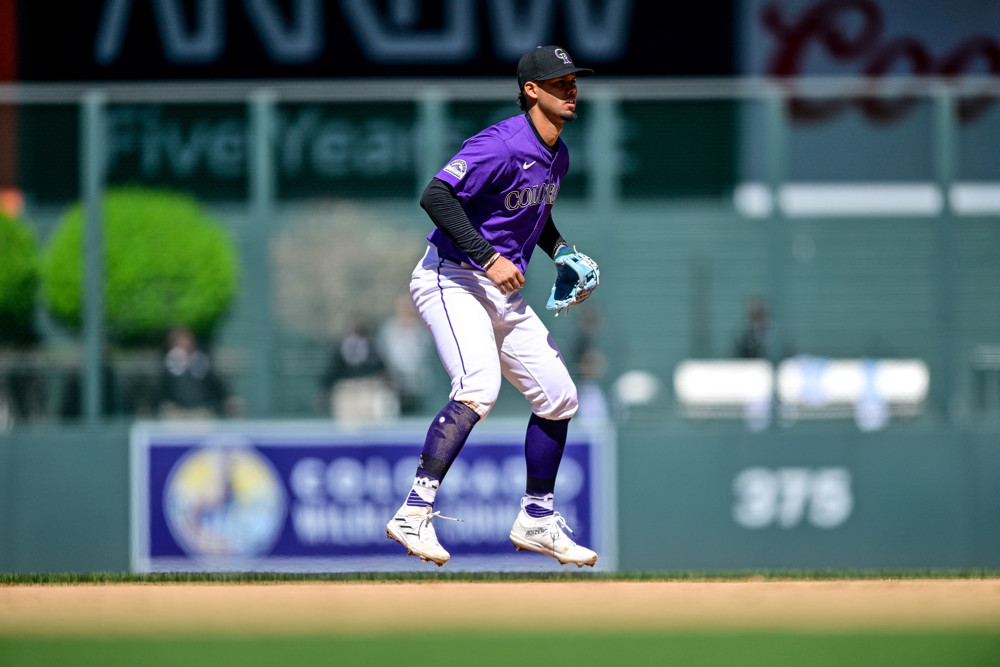 Ezequiel Tovar stands ready to make a play at shortstop for the Rockies