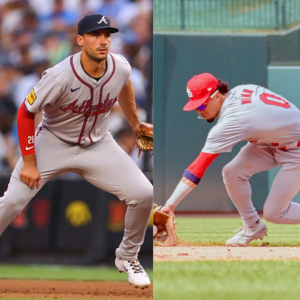 In the left side of the picture, Matt Olson prepares to field a ball. In the right side of the picture, Cardinals shortstop Masyn Winn backhands a ground ball