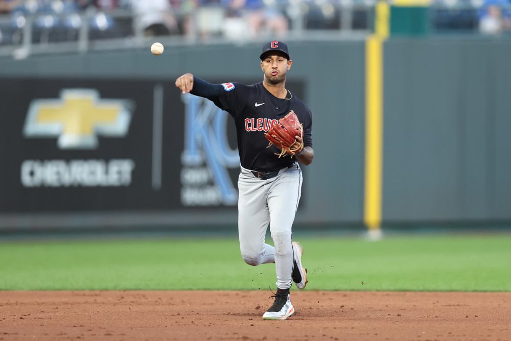 Brayan Rocchio releases the ball on a throw to first base.